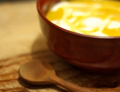 parangikkai soup in a bowl with coconut milk